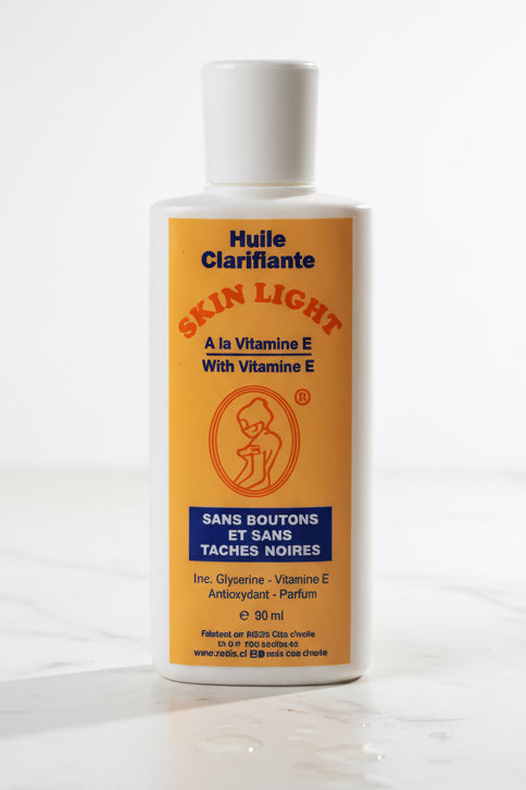 Skin light Oil 90ml ( Huile Clarifiante Skin light )